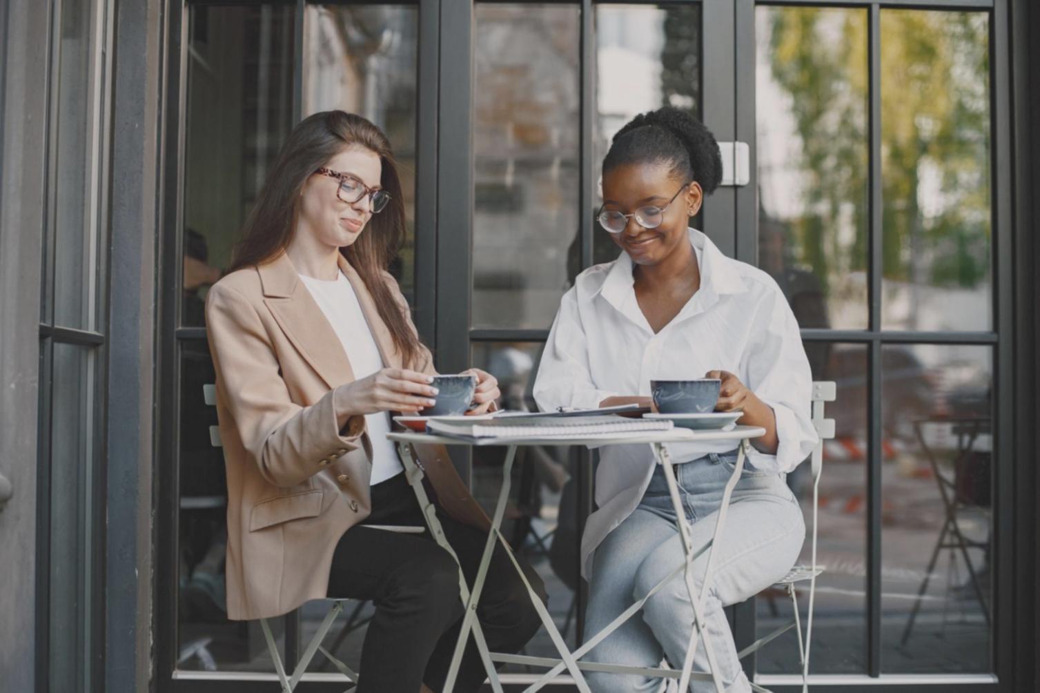 Small business owner working on financial reports at desk