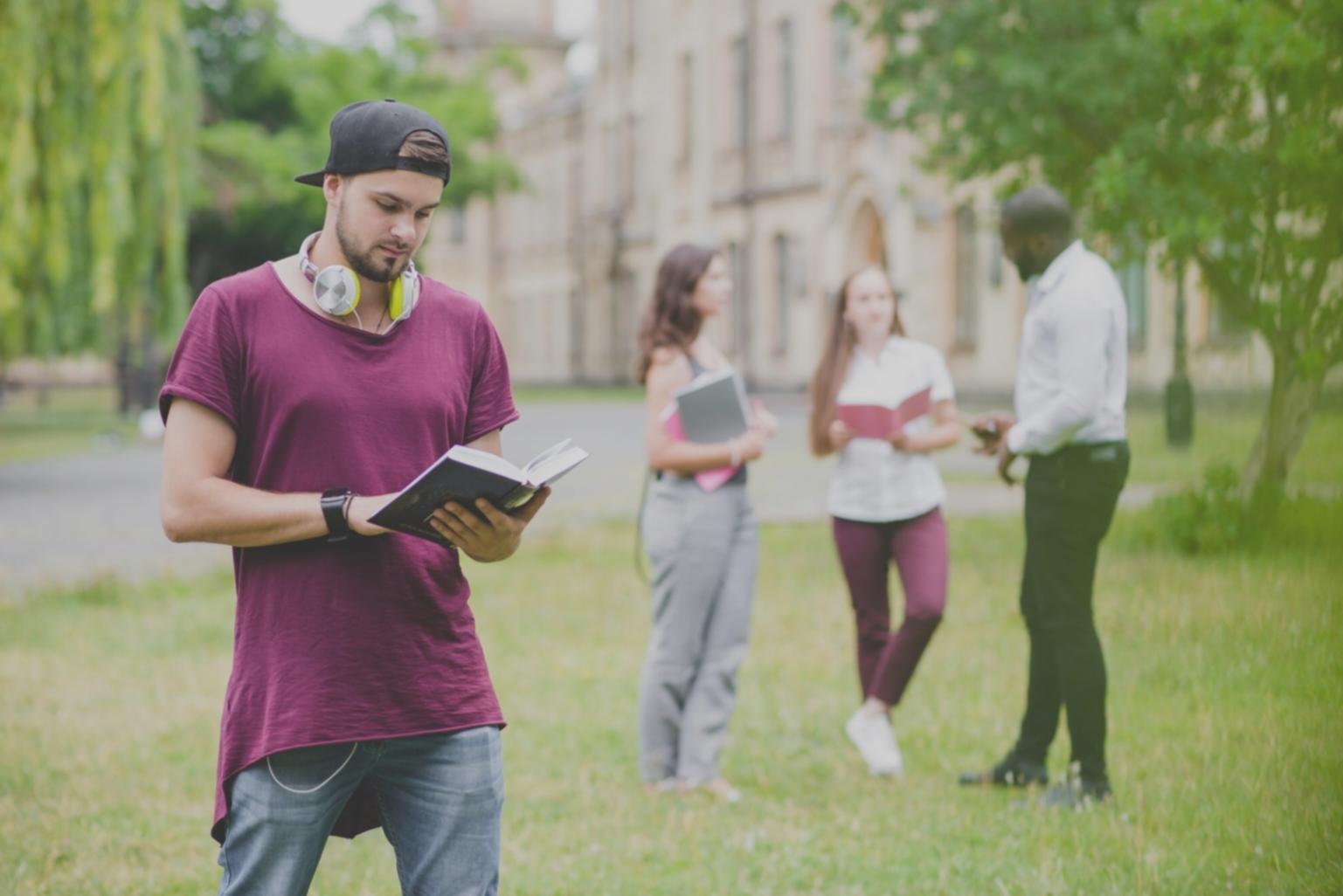 Business owner reviewing financial documents with calculator and charts